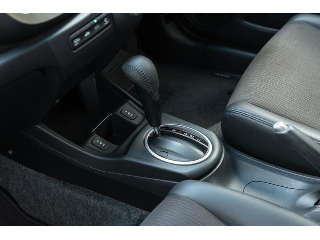 フィット 15XH ファインスタイル GE8最終モデル特別仕様車15XHファインスタイル!記録簿9枚・メモリナビ・Bカメラ・地デジ・HID・無限サス・専用15インチAW・専用メッキグリル&リアガーニッシュ・専用ブラウン内装・新品シフトノブ(32枚目)