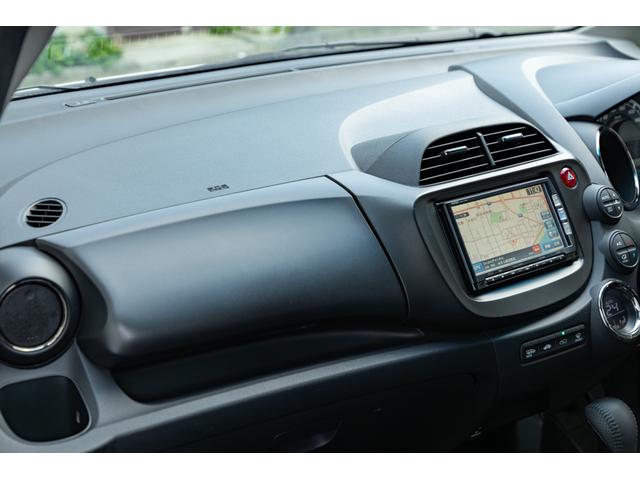 フィット 15XH ファインスタイル GE8最終モデル特別仕様車15XHファインスタイル!記録簿9枚・メモリナビ・Bカメラ・地デジ・HID・無限サス・専用15インチAW・専用メッキグリル&リアガーニッシュ・専用ブラウン内装・新品シフトノブ(34枚目)