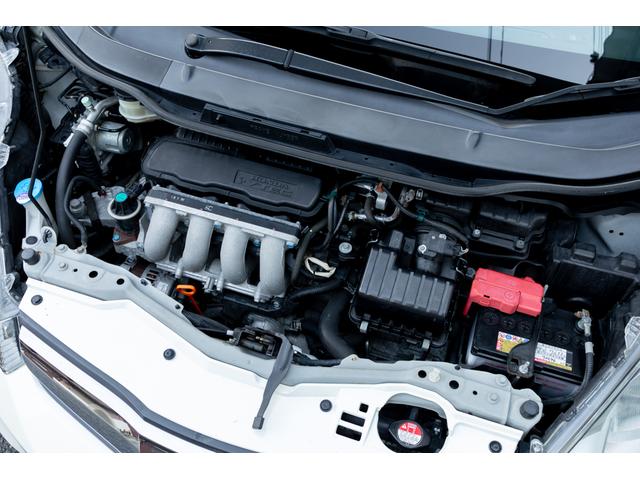 フィット 15XH ファインスタイル GE8最終モデル特別仕様車15XHファインスタイル!記録簿9枚・メモリナビ・Bカメラ・地デジ・HID・無限サス・専用15インチAW・専用メッキグリル&リアガーニッシュ・専用ブラウン内装・新品シフトノブ(39枚目)