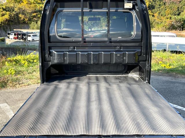 スーパーキャリイ Ｘ　禁煙車　衝突軽減システム　４ＷＤ　ワンオーナー車　キーレス　三方開　オーバーヘットシェルフ　ゲートプロテクタ　荷台マット　ＣＤチューナー　点検整備付（10枚目）