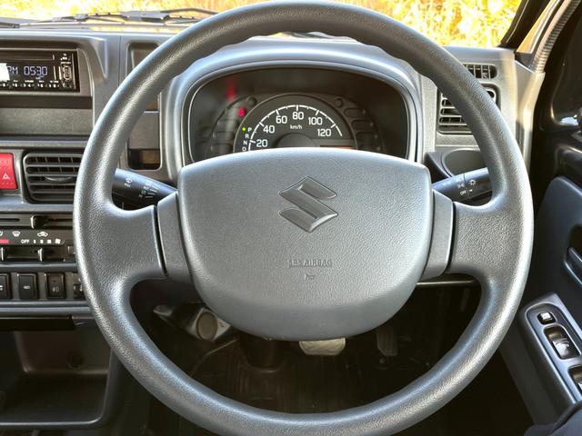 スーパーキャリイ Ｘ　禁煙車　衝突軽減システム　４ＷＤ　ワンオーナー車　キーレス　三方開　オーバーヘットシェルフ　ゲートプロテクタ　荷台マット　ＣＤチューナー　点検整備付（13枚目）