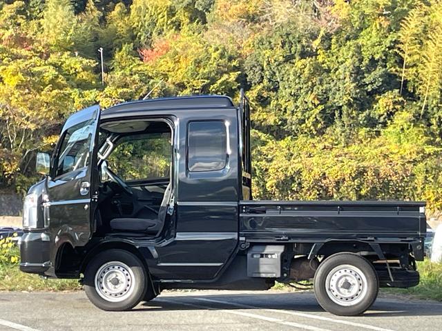 スーパーキャリイ Ｘ　禁煙車　衝突軽減システム　４ＷＤ　ワンオーナー車　キーレス　三方開　オーバーヘットシェルフ　ゲートプロテクタ　荷台マット　ＣＤチューナー　点検整備付（24枚目）