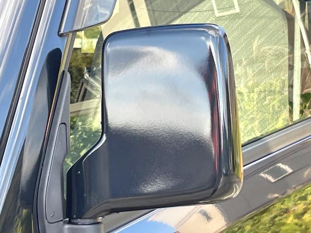 スーパーキャリイ Ｘ　禁煙車　衝突軽減システム　４ＷＤ　ワンオーナー車　キーレス　三方開　オーバーヘットシェルフ　ゲートプロテクタ　荷台マット　ＣＤチューナー　点検整備付（31枚目）