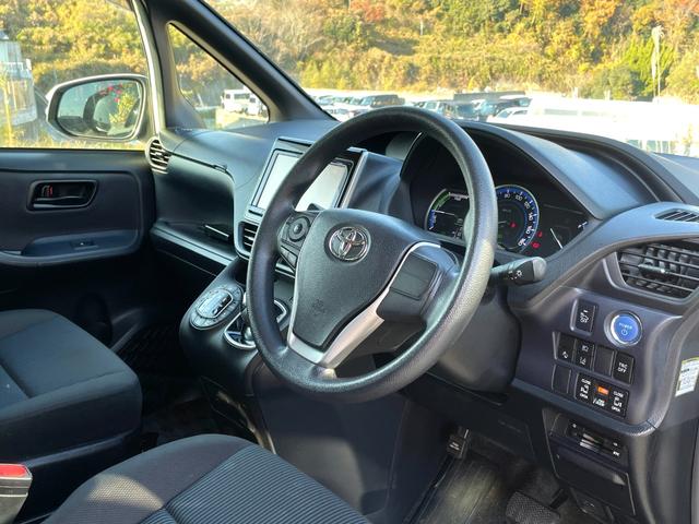 ノア ハイブリッドX ディライトプラス 禁煙車 純正9インチナビ 両側電動スライドドア 純正後席フリップダウンモニター 衝突軽減システム レーンキープ 前後ドラレコ バックカメラ Bluetooth フルセグTV ETC スマートキー2個(9枚目)