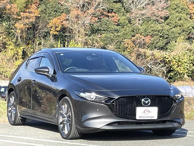MAZDA3ファストバック 20Sバーガンディ セレクション 禁煙車 ワンオーナー 赤革シート 全方位カメラ BOSEサウンド レーダークルコン 衝突軽減システム レーンキープ ブラインドスポットモニター 純正ナビ フルセグTV シートヒーター スマートキー(6枚目)