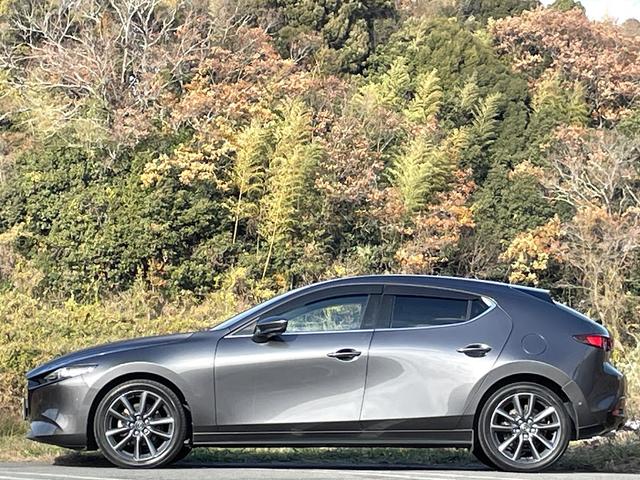 MAZDA3ファストバック 20Sバーガンディ セレクション 禁煙車 ワンオーナー 赤革シート 全方位カメラ BOSEサウンド レーダークルコン 衝突軽減システム レーンキープ ブラインドスポットモニター 純正ナビ フルセグTV シートヒーター スマートキー(32枚目)