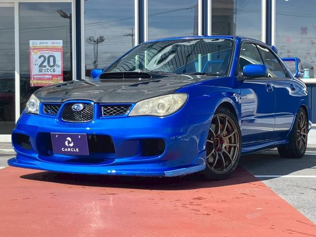 インプレッサ ＷＲＸ　ＳＴｉ　カーボンボンネット　３連メーター　ＭＯＭＯハンドルアドバンレーシングアルミ　柿本改マフラー　テイン車高調　ブレンボキャリパー　スーパーレーダー　リアウィング社外ナビ　バックモニター　ＴＶ　ＢＴ　ＥＴＣ（2枚目）