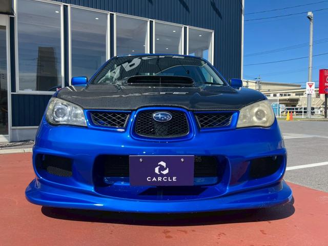 インプレッサ ＷＲＸ　ＳＴｉ　カーボンボンネット　３連メーター　ＭＯＭＯハンドルアドバンレーシングアルミ　柿本改マフラー　テイン車高調　ブレンボキャリパー　スーパーレーダー　リアウィング社外ナビ　バックモニター　ＴＶ　ＢＴ　ＥＴＣ（5枚目）