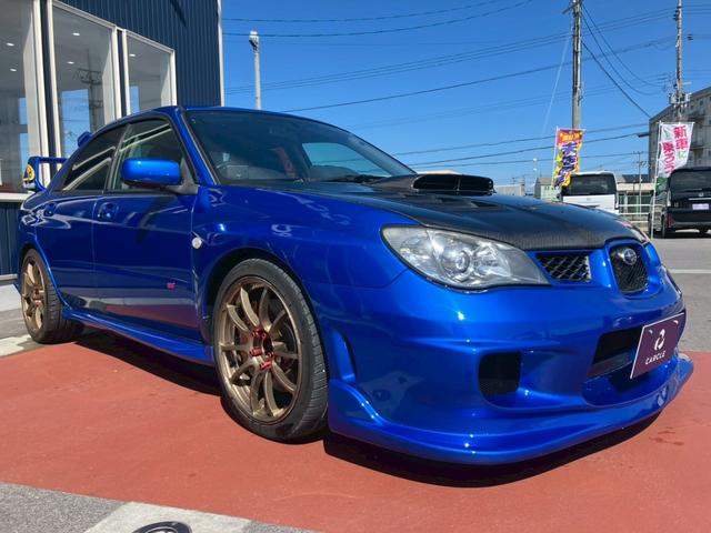 インプレッサ ＷＲＸ　ＳＴｉ　カーボンボンネット　３連メーター　ＭＯＭＯハンドルアドバンレーシングアルミ　柿本改マフラー　テイン車高調　ブレンボキャリパー　スーパーレーダー　リアウィング社外ナビ　バックモニター　ＴＶ　ＢＴ　ＥＴＣ（6枚目）