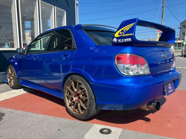 インプレッサ ＷＲＸ　ＳＴｉ　カーボンボンネット　３連メーター　ＭＯＭＯハンドルアドバンレーシングアルミ　柿本改マフラー　テイン車高調　ブレンボキャリパー　スーパーレーダー　リアウィング社外ナビ　バックモニター　ＴＶ　ＢＴ　ＥＴＣ（9枚目）