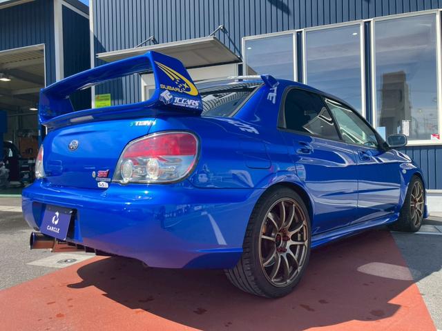 インプレッサ ＷＲＸ　ＳＴｉ　カーボンボンネット　３連メーター　ＭＯＭＯハンドルアドバンレーシングアルミ　柿本改マフラー　テイン車高調　ブレンボキャリパー　スーパーレーダー　リアウィング社外ナビ　バックモニター　ＴＶ　ＢＴ　ＥＴＣ（11枚目）