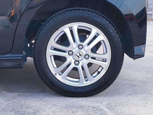 N-BOXカスタム G・Lパッケージ 両側パワースライド/フリップダウン/バックカメラ/ナビ/地デジ/DVD/キセノン/プッシュスタート/スマートキー/オートエアコン/オートライト/14インチアルミ/ISOFIX対応セカンドシート/(52枚目)