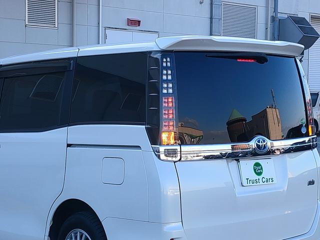 ヴォクシー ハイブリッドV 禁煙車/両側パワスラ/フリップダウン/クルコン/シートヒーター/ETC/ナビ/フルセグ/DVD再生/CD/LEDヘッド/スマートキー/プッシュスタート/15インチアルミ/(23枚目)