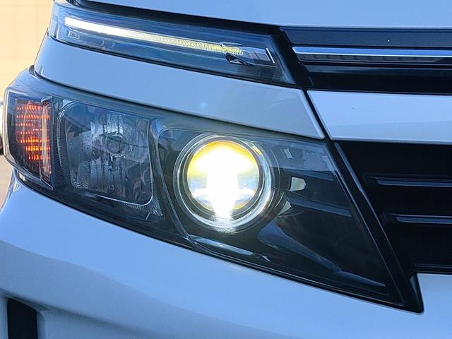 ヴォクシー ハイブリッドV 禁煙車/両側パワスラ/フリップダウン/クルコン/シートヒーター/ETC/ナビ/フルセグ/DVD再生/CD/LEDヘッド/スマートキー/プッシュスタート/15インチアルミ/(26枚目)