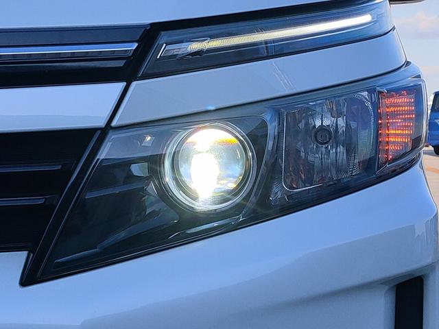 ヴォクシー ハイブリッドV 禁煙車/両側パワスラ/フリップダウン/クルコン/シートヒーター/ETC/ナビ/フルセグ/DVD再生/CD/LEDヘッド/スマートキー/プッシュスタート/15インチアルミ/(27枚目)