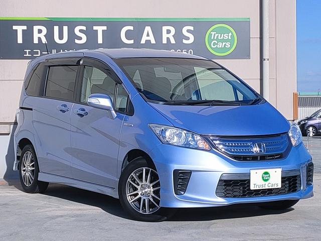 フリードハイブリッド ジャストセレクション　禁煙車／７人乗り／パワスラ／クルーズコントロール／ＥＴＣ／ナビ／Ｂカメラ／Ｂｌｕｅｔｏｏｔｈ／フルセグ／ＤＶＤ再生／ＣＤ／スマートキー／社外１５ＡＷ／オートエアコン／タイミングチェーン／ＩＳＯＦＩＸ（16枚目）