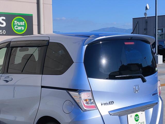 フリードハイブリッド ジャストセレクション　禁煙車／７人乗り／パワスラ／クルーズコントロール／ＥＴＣ／ナビ／Ｂカメラ／Ｂｌｕｅｔｏｏｔｈ／フルセグ／ＤＶＤ再生／ＣＤ／スマートキー／社外１５ＡＷ／オートエアコン／タイミングチェーン／ＩＳＯＦＩＸ（31枚目）