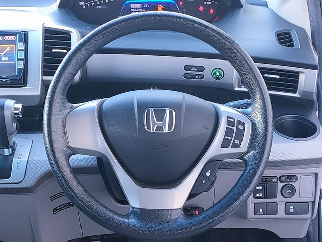 フリードハイブリッド ジャストセレクション　禁煙車／７人乗り／パワスラ／クルーズコントロール／ＥＴＣ／ナビ／Ｂカメラ／Ｂｌｕｅｔｏｏｔｈ／フルセグ／ＤＶＤ再生／ＣＤ／スマートキー／社外１５ＡＷ／オートエアコン／タイミングチェーン／ＩＳＯＦＩＸ（39枚目）