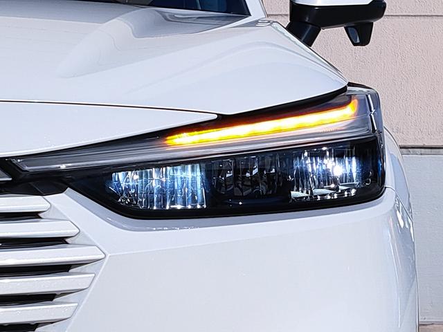 ヴェゼル e:HEV X 禁煙車/ホンダセンシング/OPカラー/クルコン/9インチナビ/Bluetooth/フルセグ/バックカメラ/ワイヤレス充電/LEDヘッドライト/ETC/プッシュスタート/スマートキー/16AW(12枚目)