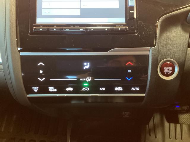 フィットハイブリッド Ｌパッケージ　ハイブリッド　ＥＴＣ　バックカメラ　ナビ　ＴＶ　オートクルーズコントロール　オートライト　ＬＥＤヘッドランプ　スマートキー　ＡＴ　盗難防止システム　衝突安全ボディ　ＣＤ　ＤＶＤ再生（13枚目）