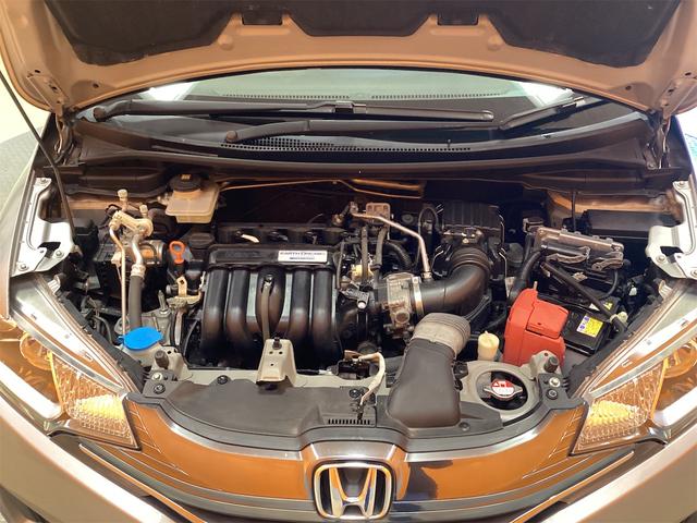 フィットハイブリッド Ｌパッケージ　ハイブリッド　ＥＴＣ　バックカメラ　ナビ　ＴＶ　オートクルーズコントロール　オートライト　ＬＥＤヘッドランプ　スマートキー　ＡＴ　盗難防止システム　衝突安全ボディ　ＣＤ　ＤＶＤ再生（22枚目）