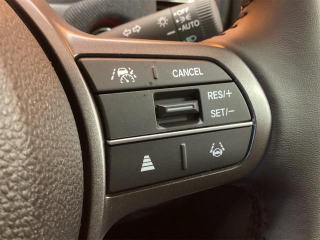 フリード ｅ：ＨＥＶエアー　ＥＸ　バックカメラ　クリアランスソナー　オートクルーズコントロール　レーンアシスト　衝突被害軽減システム　両側電動スライドドア　オートライト　ＬＥＤヘッドランプ　スマートキー　アイドリングストップ（9枚目）