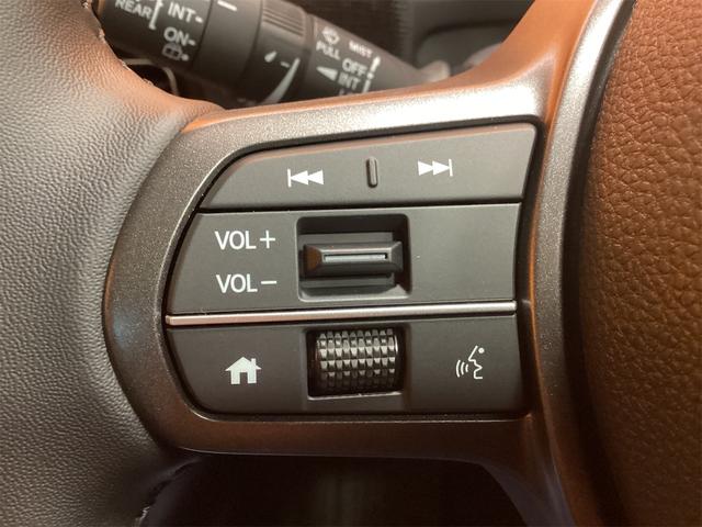 フリード ｅ：ＨＥＶエアー　ＥＸ　バックカメラ　クリアランスソナー　オートクルーズコントロール　レーンアシスト　衝突被害軽減システム　両側電動スライドドア　オートライト　ＬＥＤヘッドランプ　スマートキー　電動格納ミラー　シートヒーター（10枚目）