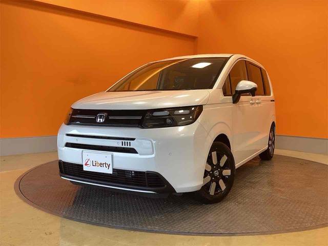 フリード ｅ：ＨＥＶエアー　ＥＸ　バックカメラ　クリアランスソナー　オートクルーズコントロール　レーンアシスト　衝突被害軽減システム　両側電動スライドドア　オートライト　ＬＥＤヘッドランプ　スマートキー　電動格納ミラー　シートヒーター（15枚目）