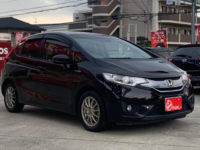 フィットハイブリッド Ｌパッケージ　衝突軽減ブレーキ　メモリーナビ　バックカメラ　地デジＴＶ　クルーズコントロール　ＥＴＣ　ＬＥＤヘッドライト　スマートキー　社外１５インチアルミホイール（5枚目）