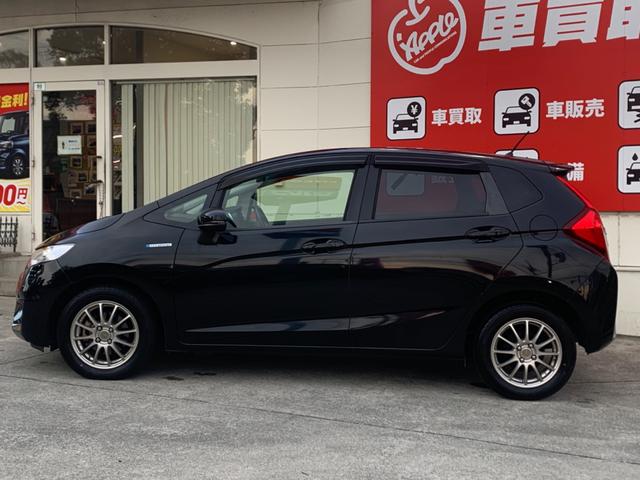 フィットハイブリッド Ｌパッケージ　衝突軽減ブレーキ　メモリーナビ　バックカメラ　地デジＴＶ　クルーズコントロール　ＥＴＣ　ＬＥＤヘッドライト　スマートキー　社外１５インチアルミホイール（9枚目）