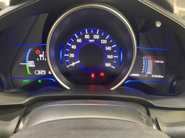 フィットハイブリッド Ｌパッケージ　衝突軽減ブレーキ　メモリーナビ　バックカメラ　地デジＴＶ　クルーズコントロール　ＥＴＣ　ＬＥＤヘッドライト　スマートキー　社外１５インチアルミホイール（11枚目）