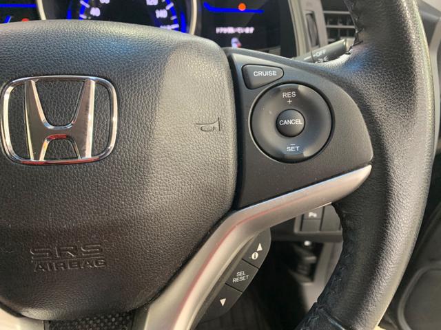 フィットハイブリッド Ｌパッケージ　衝突軽減ブレーキ　メモリーナビ　バックカメラ　地デジＴＶ　クルーズコントロール　ＥＴＣ　ＬＥＤヘッドライト　スマートキー　社外１５インチアルミホイール（12枚目）