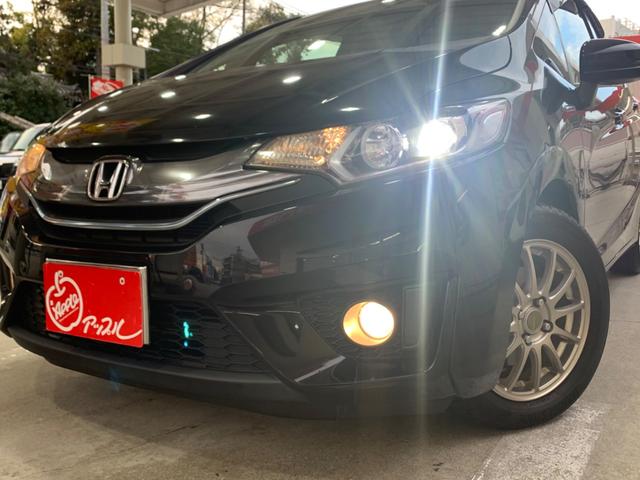 フィットハイブリッド Ｌパッケージ　衝突軽減ブレーキ　メモリーナビ　バックカメラ　地デジＴＶ　クルーズコントロール　ＥＴＣ　ＬＥＤヘッドライト　スマートキー　社外１５インチアルミホイール（30枚目）