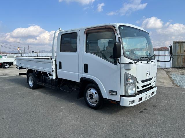 タイタントラック 　２ｔ　ダブルキャブ　標準ロング　準中型　６人乗り　２トン　Ｗキャブ　オートマ　ＡＴ　２ペダル　内フック　３方開　電動格納ミラー　ハイキャブ　ターボ車　積載量１．８００ｋｇ　荷台鉄板張り　坂道補助装置（2枚目）