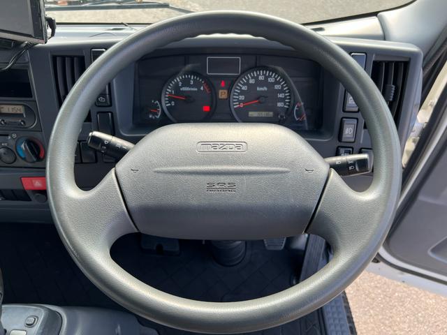 タイタントラック 　２ｔ　ダブルキャブ　標準ロング　準中型　６人乗り　２トン　Ｗキャブ　オートマ　ＡＴ　２ペダル　内フック　３方開　電動格納ミラー　ハイキャブ　ターボ車　積載量１．８００ｋｇ　荷台鉄板張り　坂道補助装置（25枚目）