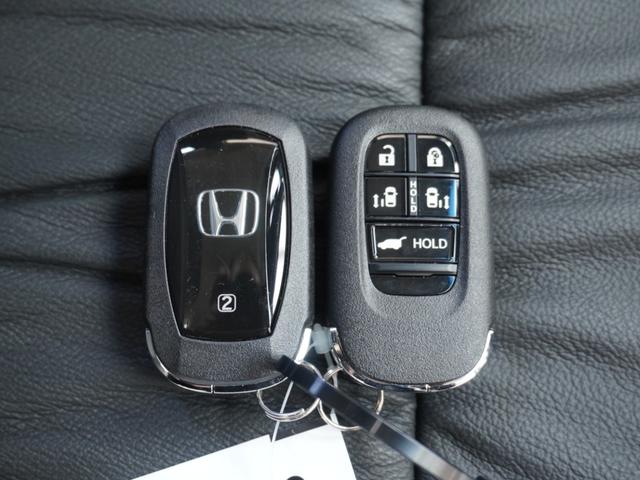 オデッセイハイブリッド e:HEVアブソルート・EX 弊社元デモカー 11インチナビ(純正用品LXM247VFLi) 全周囲カメラ ドラレコ ETC 両側電動スライドドア シートヒーター Bluetooth LEDヘッドライト パドルシフト オットマン(76枚目)