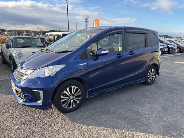 フリードハイブリッド ジャストセレクション　ナビ　テレビ　ＣＤ／ＤＶＤ　ＥＴＣ　バックカメラ　ドラレコ　両側パワースライドドア　禁煙車　ＢＴ接続　ＨＩＤ　スマートキー　クルーズコントロール（17枚目）