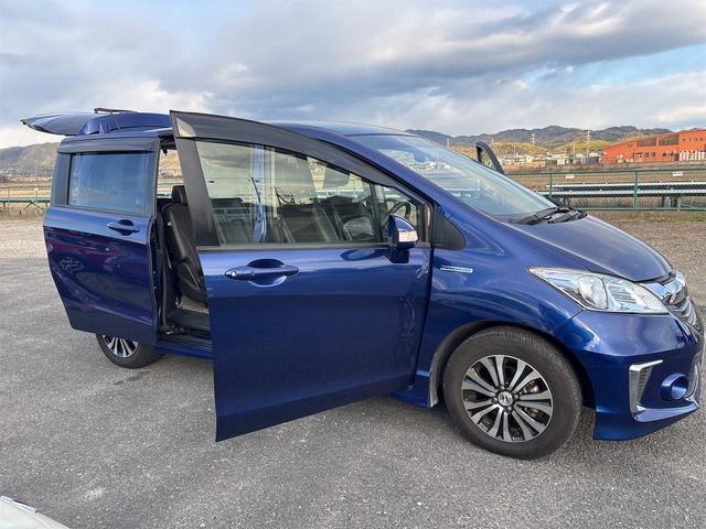 フリードハイブリッド ジャストセレクション　ナビ　テレビ　ＣＤ／ＤＶＤ　ＥＴＣ　バックカメラ　ドラレコ　両側パワースライドドア　禁煙車　ＢＴ接続　ＨＩＤ　スマートキー　クルーズコントロール（21枚目）