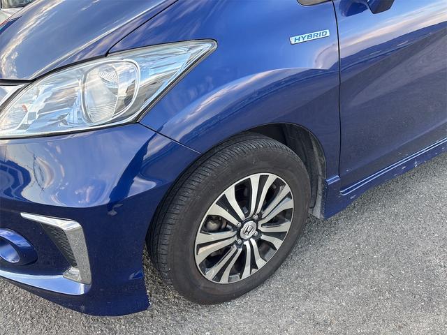 フリードハイブリッド ジャストセレクション　ナビ　テレビ　ＣＤ／ＤＶＤ　ＥＴＣ　バックカメラ　ドラレコ　両側パワースライドドア　禁煙車　ＢＴ接続　ＨＩＤ　スマートキー　クルーズコントロール（51枚目）