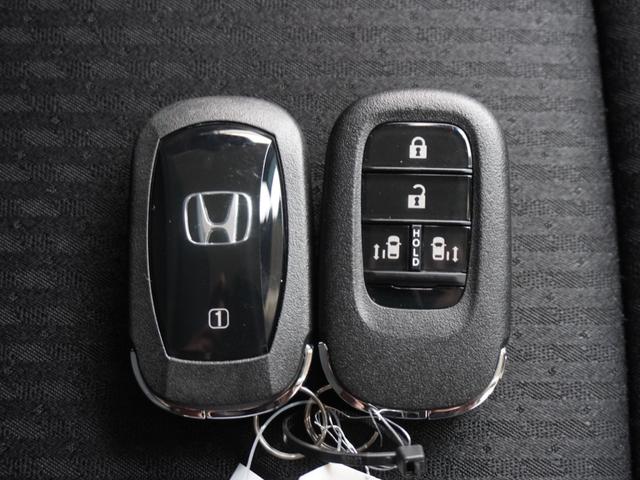 オデッセイハイブリッド ｅ：ＨＥＶアブソルート　デモカー　１１インチナビ　両側電動スライドドア　ドラレコ　シートヒーター　バックカメラ　障害物センサー　ＥＴＣ　ＤＶＤ　Ｂｌｕｅｔｏｏｔｈ　ＬＥＤヘッドライト　横滑り防止装置　衝突被害軽減ブレーキ（36枚目）