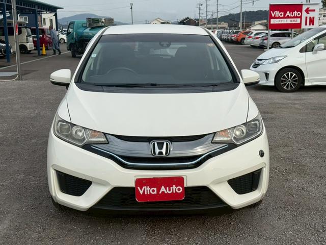 フィットハイブリッド Ｌパッケージ　メモリーナビ　ワンセグＴＶ　リアカメラ　スマートキー　ＬＥＤヘッドライト　衝突軽減ブレーキ　Ｂｌｕｅｔｏｏｔｈ　社外１５インチアルミ　ＥＴＣ（4枚目）