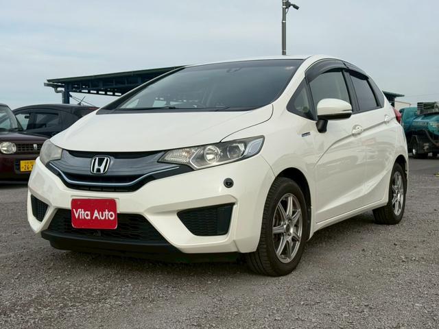 フィットハイブリッド Ｌパッケージ　メモリーナビ　ワンセグＴＶ　リアカメラ　スマートキー　ＬＥＤヘッドライト　衝突軽減ブレーキ　Ｂｌｕｅｔｏｏｔｈ　社外１５インチアルミ　ＥＴＣ（5枚目）