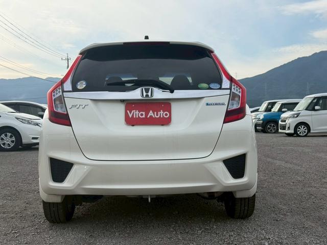 フィットハイブリッド Ｌパッケージ　メモリーナビ　ワンセグＴＶ　リアカメラ　スマートキー　ＬＥＤヘッドライト　衝突軽減ブレーキ　Ｂｌｕｅｔｏｏｔｈ　社外１５インチアルミ　ＥＴＣ（11枚目）