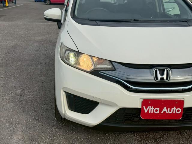 フィットハイブリッド Ｌパッケージ　メモリーナビ　ワンセグＴＶ　リアカメラ　スマートキー　ＬＥＤヘッドライト　衝突軽減ブレーキ　Ｂｌｕｅｔｏｏｔｈ　社外１５インチアルミ　ＥＴＣ（16枚目）