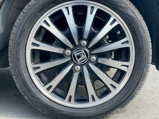 N-BOXカスタム G・ターボLパッケージ ディスプレイオーディオ リアカメラ スマートキー HIDヘッドライト 両側パワスラ クルコン 純正15インチアルミ ETC(14枚目)