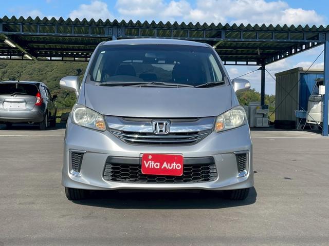 フリードハイブリッド ジャストセレクション メモリーナビ ワンセグTV リアカメラ スマートキー HIDヘッドライト 両側パワスラ Bluetooth クルコン 純正15インチ鉄 ETC(3枚目)