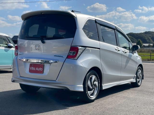 フリードハイブリッド ジャストセレクション メモリーナビ ワンセグTV リアカメラ スマートキー HIDヘッドライト 両側パワスラ Bluetooth クルコン 純正15インチ鉄 ETC(12枚目)