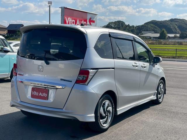 フリードハイブリッド ジャストセレクション メモリーナビ ワンセグTV リアカメラ スマートキー HIDヘッドライト 両側パワスラ Bluetooth クルコン 純正15インチ鉄 ETC(13枚目)