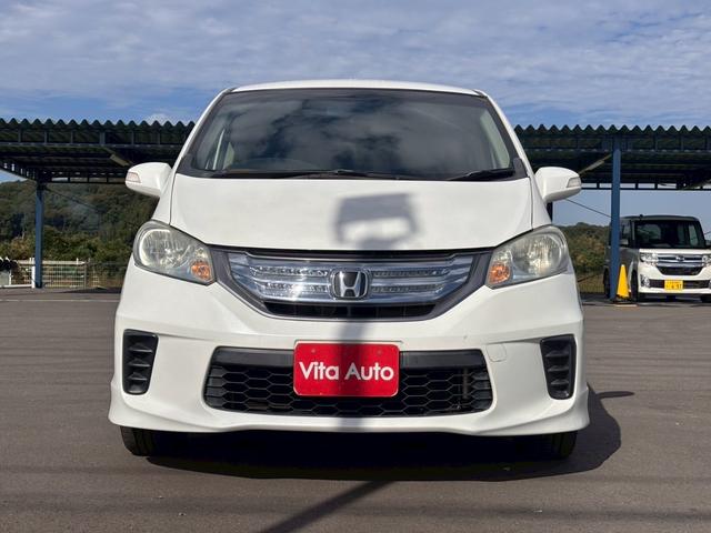 フリードハイブリッド ジャストセレクション メモリーナビ フルセグTV リアカメラ フリップダウンモニター スマートキー HIDヘッドライト 両側パワスラ Bluetooth クルコン 社外15インチアルミ ETC(4枚目)