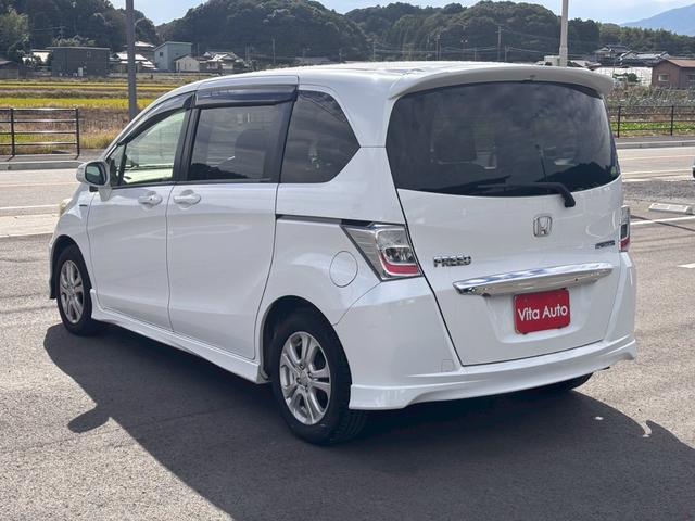 フリードハイブリッド ジャストセレクション メモリーナビ フルセグTV リアカメラ フリップダウンモニター スマートキー HIDヘッドライト 両側パワスラ Bluetooth クルコン 社外15インチアルミ ETC(11枚目)